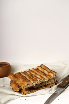 Traditional Persian Bread on a White Table (Barbari )