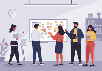 Collaborative team brainstorming session using sticky notes on a whiteboard in a modern office.