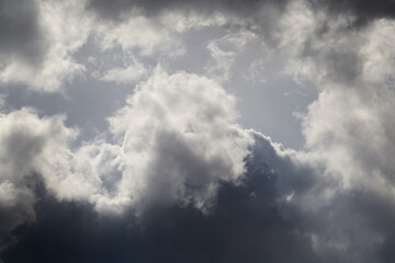 Rich gray clouds with a play of light and shadow create an atmosphere of mystery. For setting a mood in advertising materials