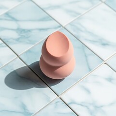 Peach Makeup Sponge on Marble Tiles, Beauty Still Life