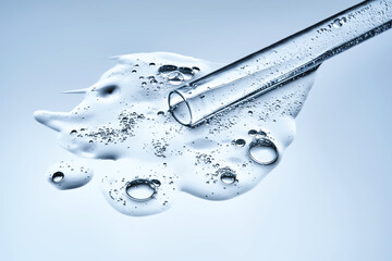 A test tube with spilled serum. Demonstration of the texture.