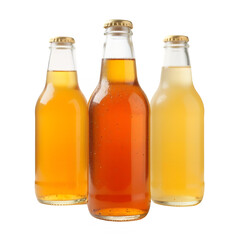 Three glass bottles filled with colorful liquid beverages stand up on transparent background