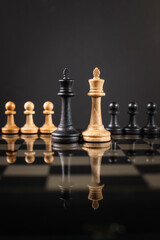 chess piece on a chessboard  on a dark background