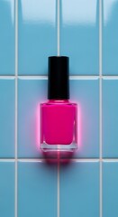 Vibrant Pink Nail Polish Bottle on Retro Blue Tile Background, Studio Shot