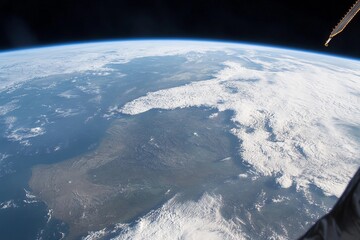 View of Earth from space captured during low-light conditions showcasing urban lights and natural atmosphere