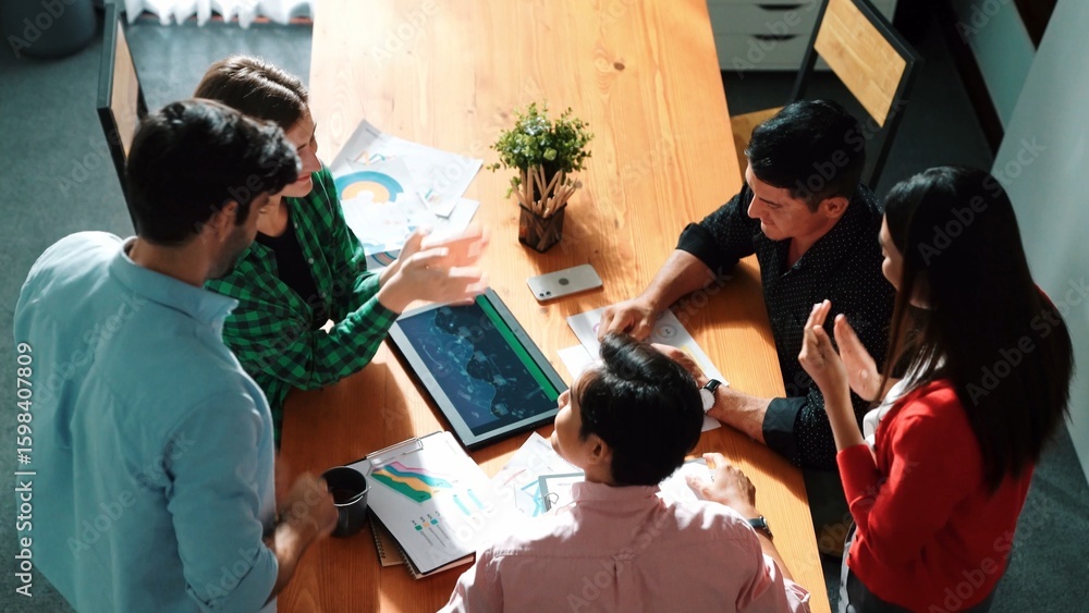 Aufkleber top view of happy creative team putting hands together while drawing mind map. group of diverse peop
