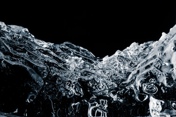 Block of crushed textured ice, on a black background
