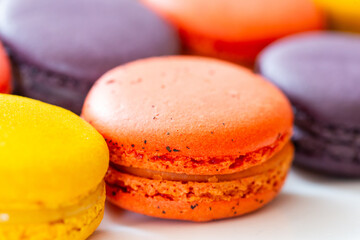 Colorful macaron on white dish