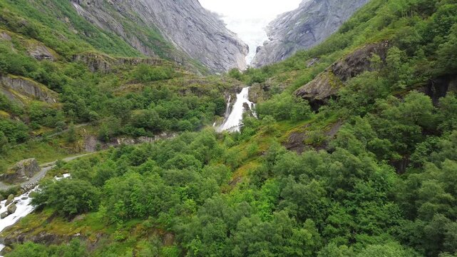 Drone View of Kleivafossen Waterfall and Briksdalsbreen Glacier in Briksdalen, Norway