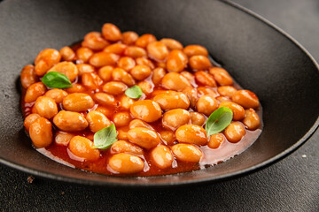 Bean stew tomato sauce cranberry beans vegetable dish beans borlotti fresh delicious gourmet food background on the table rustic food top view copy space keto and paleo diet vegan and vegan food