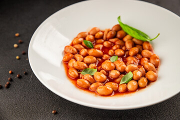 Bean stew tomato sauce cranberry beans vegetable dish beans borlotti fresh delicious gourmet food background on the table rustic food top view copy space keto and paleo diet vegan and vegan food