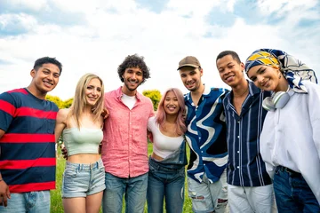  Group of multiethnic teenagers spending time outdoor on a picnic at the park © oneinchpunch