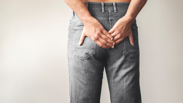 Person with hemorrhoids and constipation
