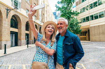Happy senior couple spending time together in London city