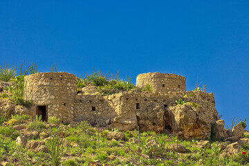 Old stone southwest architectural ruins of a tourist attraction from the mid-20th century, it was a...