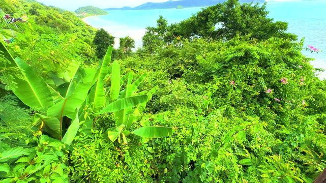 Beautiful view from Kao Khad next to Cape Panwa on the island of Phuket Thailand. Views of the turquoise Blue waters of the Andaman Sea and small islands off the coat of Phuket