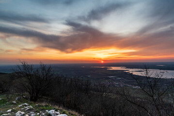 Sunset from meadow bellow Devin hill summit in Palava mountains in Czech republic