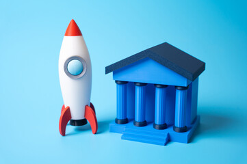 Bank building and rocket. Innovative banking. Fintech startup. Disruptive innovation in finance,...