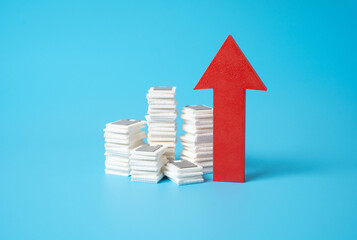 Stacks of documents and a red arrow pointing up. Increased bureaucracy, more complicated procedures...