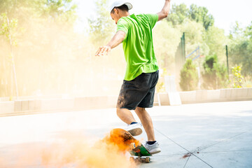 skaters with colored smoke bombs