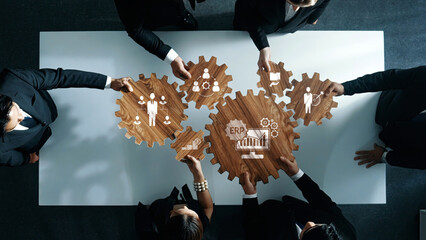 Collaborative Business Strategy with Wooden Gears and Iconic Representations for Innovative Workflow Management and Team Synergy. Amity