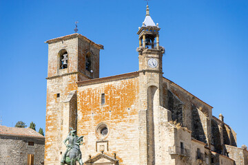 Picturesque church tower in Trujillo, Extremadura with clear blue sky