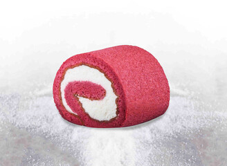 Red Velvet Cream Roll with Swirled white creamy filling on White Background side view of dessert