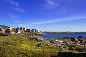 Houses in South Nanortalik looking towards a Fjord, South Greenland © JOB