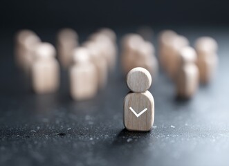 The image shows a magnifying glass concentrating on one wooden figure marked with a checkmark, distinguishing it from a group of similar figures, and implying a context of recruitment, assessment, or