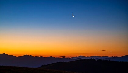 Mountain sunset with crescent moon
