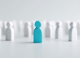 Between two groups of beige figures stands a solitary blue figure, symbolizing a divide, a distinction, or a moment of decision, and underscoring the significance of individual choice within a