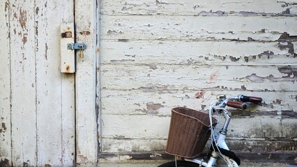 Vintage Bicycle Against Weathered Wall