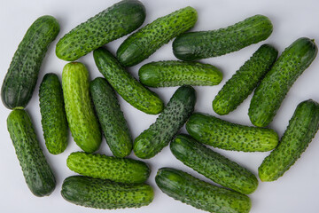 Cucumbers on the table, close-up, top view
