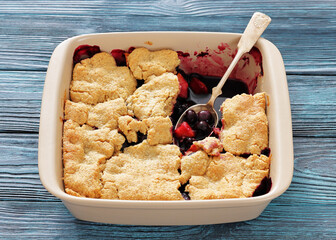 apple blueberry strawberry crumble in baking dish