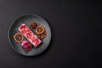 Nougat or white caramel with hazelnuts and strawberry pieces. White nougat