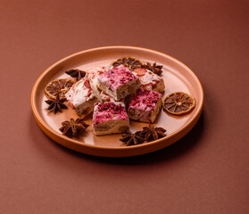 Nougat or white caramel with hazelnuts and strawberry pieces. White nougat
