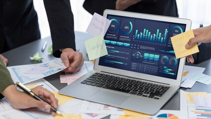 Analyst team use sticky note for creative and analytic brainstorm for business idea with BI data...