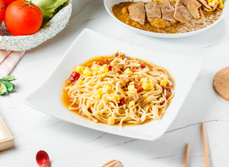 Savory Kung Pao Chicken Teppanyaki Noodles in plate side view of hing kong food