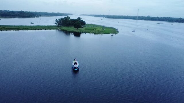 Boat trip in blue water, wonderful beauty of nature, drone video Gazipur, Dhaka, Bangladesh,