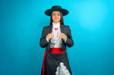 Confident latina woman proudly displaying traditional chilean Huaso attire, representing rich...