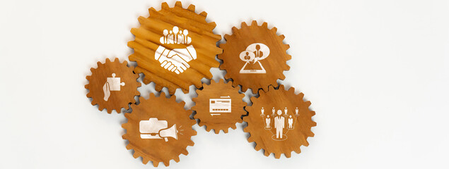 Panorama banner of wooden cogwheel gear connecting each other symbolize function productive system...
