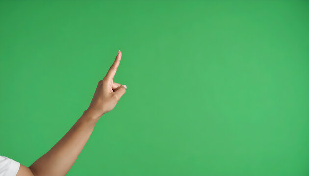 Womans hand pointing with green screen.