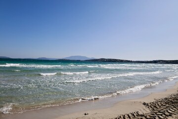 Blue sea horizon.wave crests sandy beach 