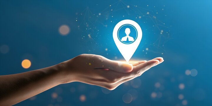 Hand Holding Location Pin with Person Icon for Business Networking and Social Media Concepts