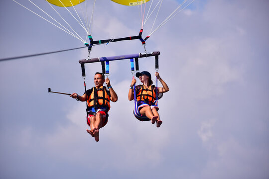 parasaling over the sea. High quality photo