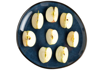 Multiple apple halves arranged on blue ceramic plate
