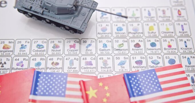 Global tensions in the China&ndash;U.S. semiconductor trade and tech war, critical mineral control (e.g. gallium, germanium) : A CPU chip, a tank and flags of China and the US placed over a periodic table.