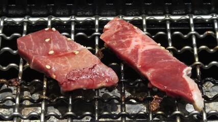 Flavorful beef belly slices are sizzling wonderfully on the grill.