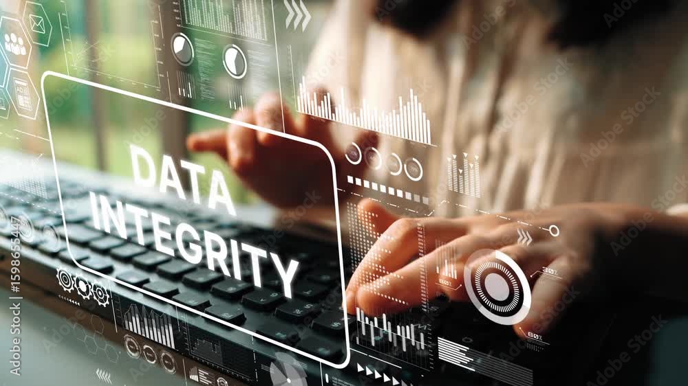 Poster close-up of hands typing on keyboard with data integrity concept and digital graphics overlay in a m