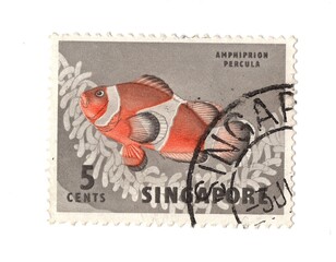 A vintage postage stamp from Singapore isolated on a white background.